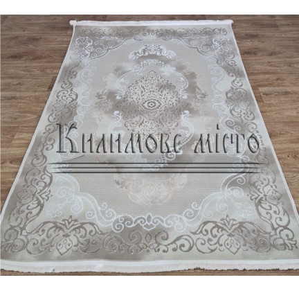 Synthetic carpet LUMY 0AT86B POLY. IVORY / BEIGE - высокое качество по лучшей цене в Украине.