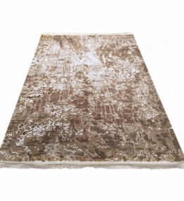 Синтетичний килим Nuans W1524 L.Brown-Gold